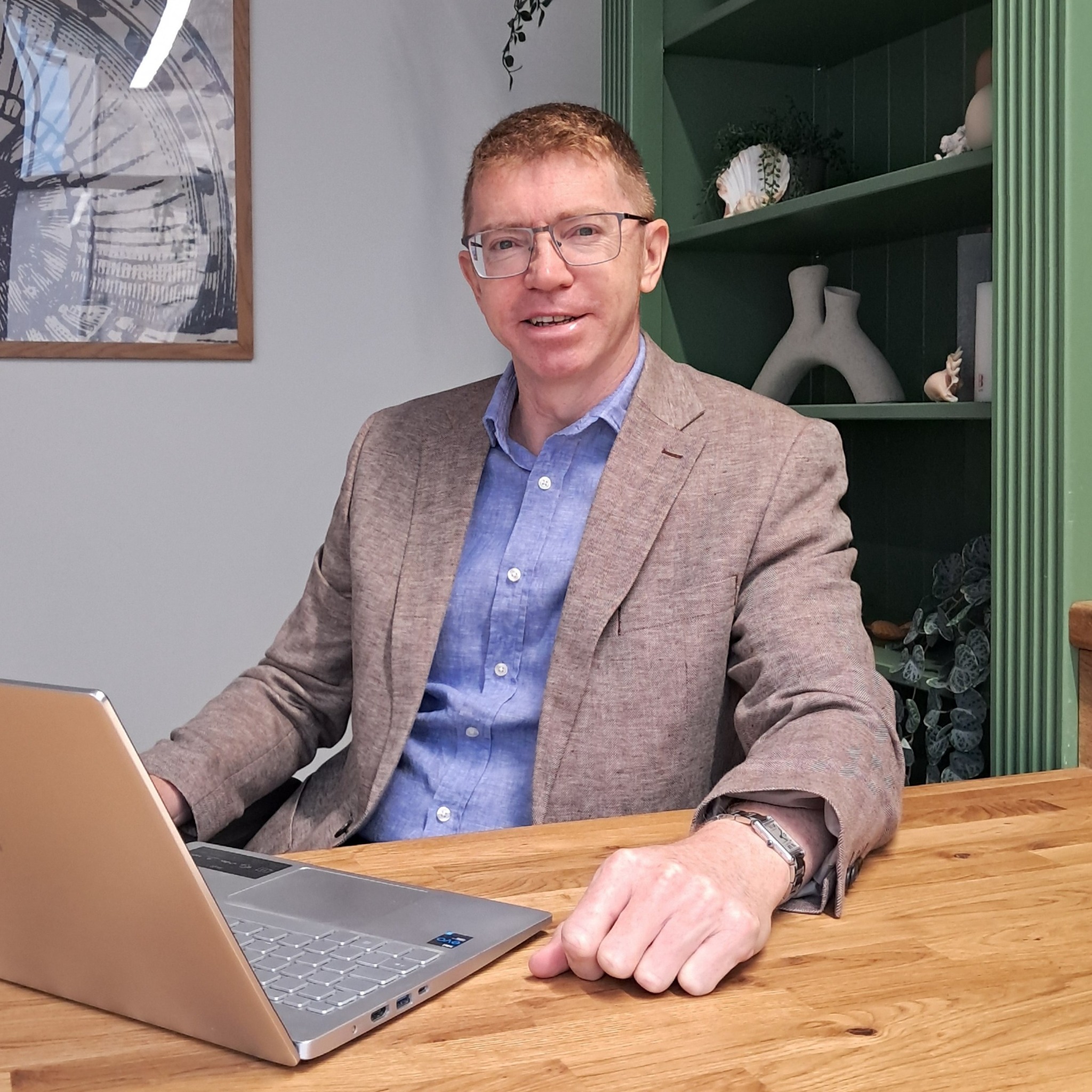 Mark Thomas at his desk